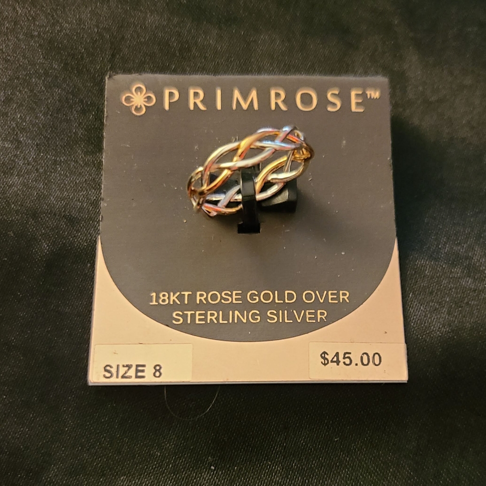 Gold and Silver Woven Ring with Intricate Design